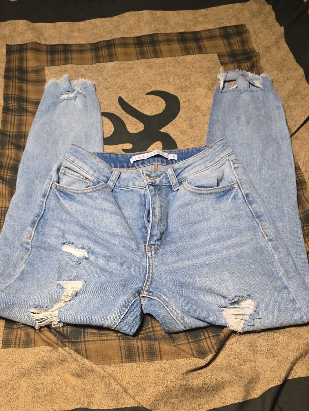 Light Blue Distressed Women’s Jeans